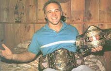 Zbyszko with the NWA Western States Heritage and AWA World Title Belts